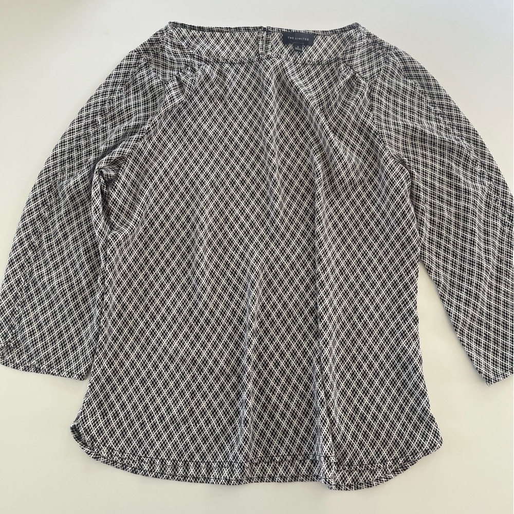 The Limited Geometric Top